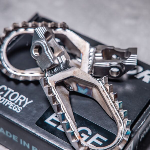 RME023 titanium footpegs photo on box close up RME023 titanium footpegs photo on box close up